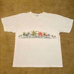 “Good fronds just shootin the breeze” White cotton T-Shirt with Tropical Palm